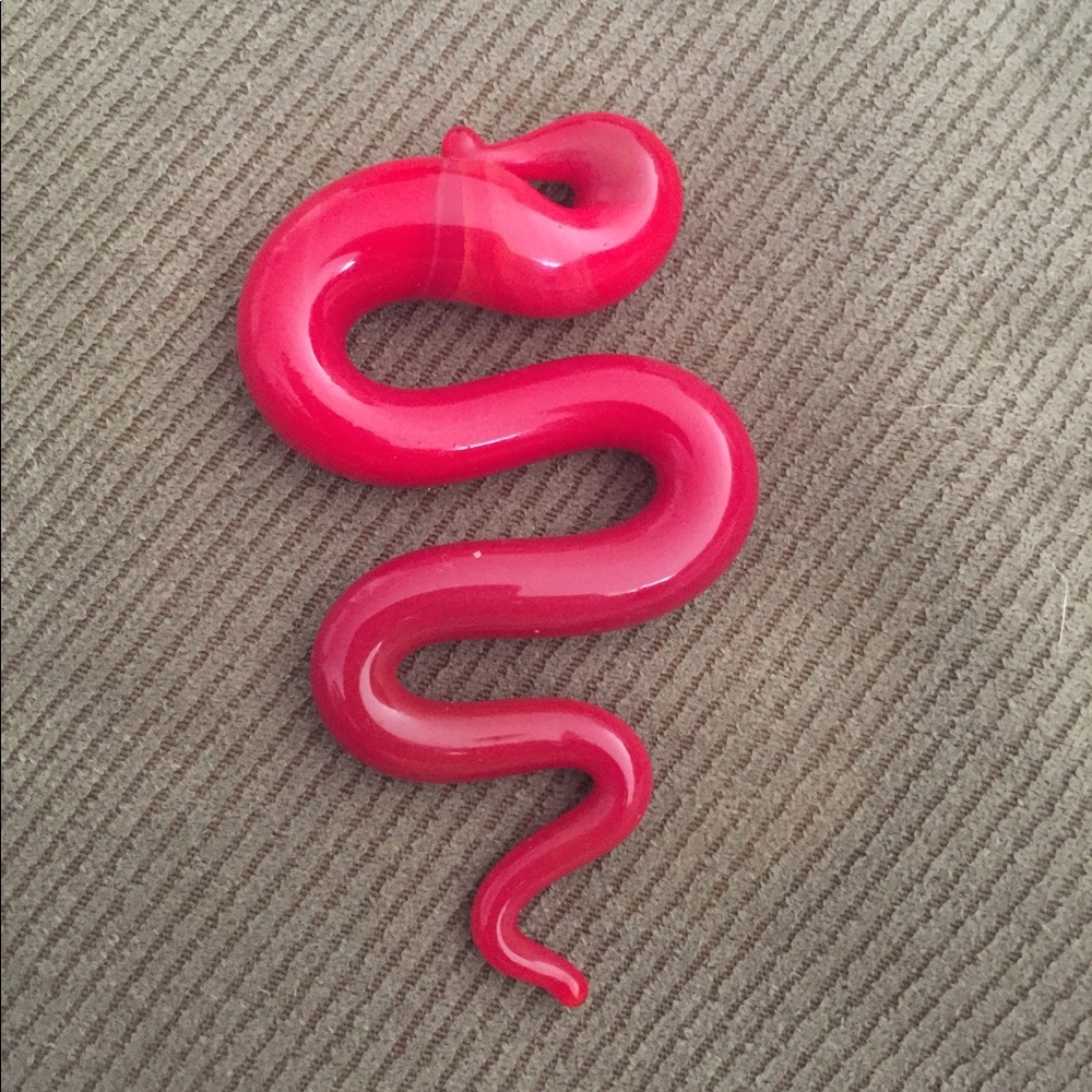 Red glass snake pendant